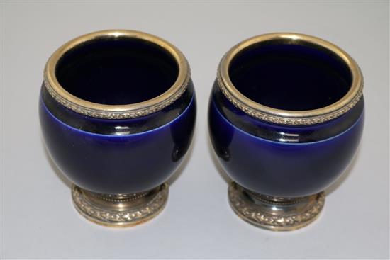 A pair of French silver mounted blue glazed porcelain vases, by Risler & Carre of Paris, 4.25in.